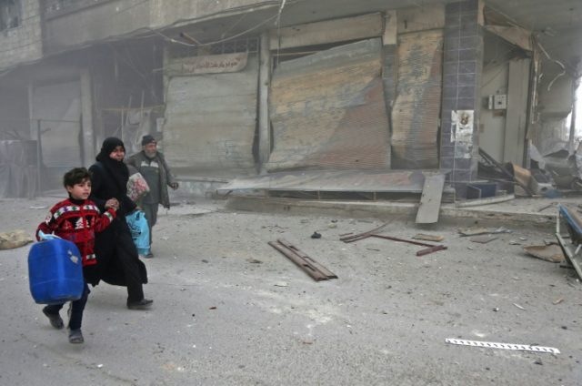 Syria army bombs splintered Ghouta enclave as bodies pile up