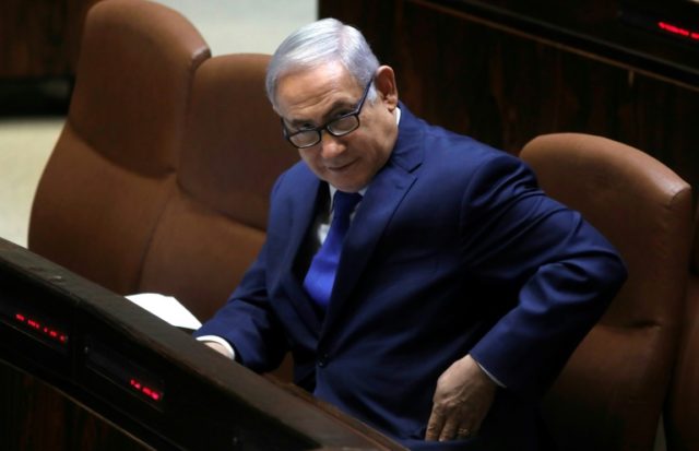 Israel avoids snap polls but Netanyahu's fate awaits