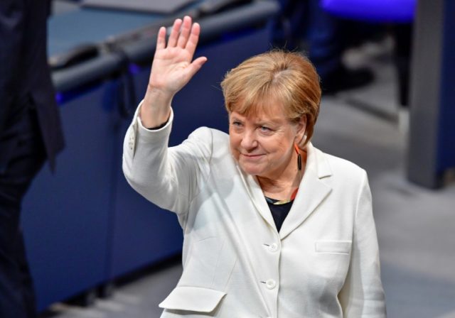 Merkel narrowly elected to fourth term as German chancellor