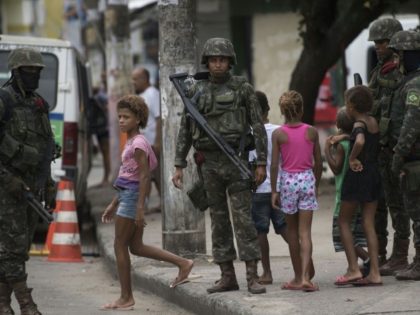 Rio favela residents march in memory of slain activist