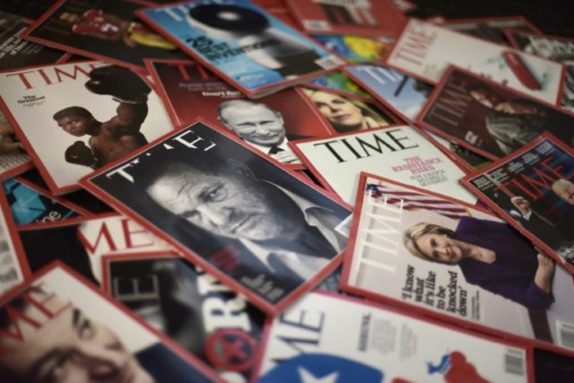 Time magazine copies are dispalyed on a table in Washgington on November 27, 2017. Time In