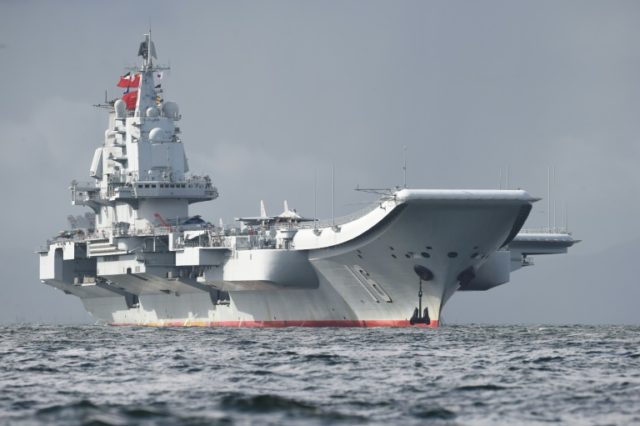 China's aircraft carrier sails past Taiwan as tensions rise