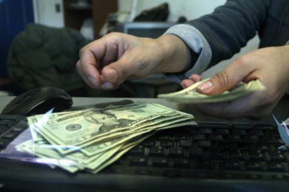 US stocks, dollar fall as Fed lifts interest rates