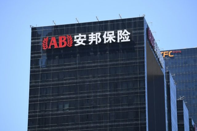 China opens high-profile trial of troubled Anbang's boss