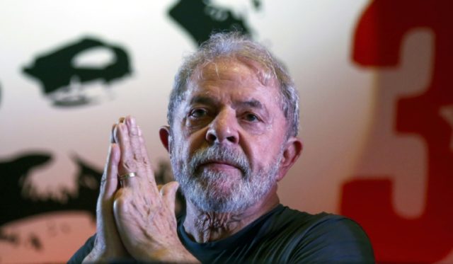 Brazil's Lula campaigns after shots fired at bus