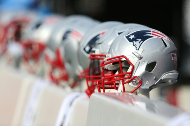 NFL owners toughen helmet hit penalty, clarify catch rule