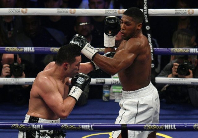 Joshua goes distance before beating Parker in heavyweight clash