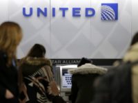 United Airlines Dead Dog FILE In this March 15, 2017, photo, people stand in line at a United Airlines counter at LaGuardia Airport in New York. A dog died on a United Airlines plane after a flight attendant ordered its owner to put the animal in the plane's overhead bin. United said Tuesday, March 13, 2018, that it took full responsibility for the incident on the Monday night flight from Houston to New York. (AP Photo/Seth Wenig, File) United to issue special pet carrier tags after dog's death