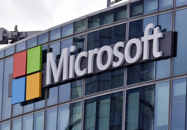 Budget Battle Email Searches This April 12, 2016, file photo shows the Microsoft logo in Issy les Moulineaux, outside Paris, France. The budget bill before Congress includes an update to federal law that makes clear that authorities with a warrant can obtain emails and other data held by U.S. technology companies but stored on servers overseas. Passage of the Cloud Act probably would end a Supreme Court dispute between Microsoft and the Trump administration over emails the U.S. wants as part of a drug trafficking investigation. (AP Photo/Michel Euler, File) The Associated Press