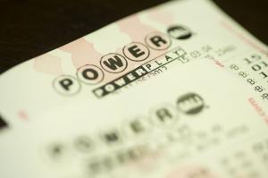 Secret $560M Powerball winner has lawyers pick up prize