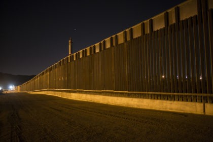 A portion of the new steel border fence stretches along the US-Mexico border in Sunland Pa