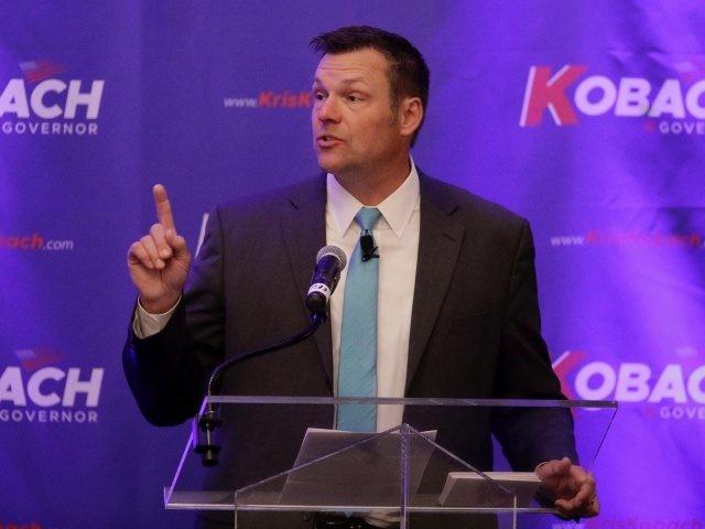 Kansas Secretary of State Kris Kobach addresses the crowd during a fundraiser for his camp