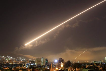Damascus skies erupt with service to air missile fire as the U.S. launches an attack on Syria targeting different parts of the Syrian capital Damascus, Syria, early Saturday, April 14, 2018. Syria's capital has been rocked by loud explosions that lit up the sky with heavy smoke as U.S. President …