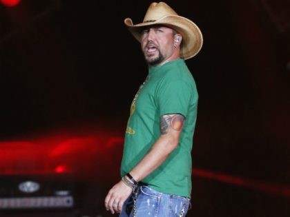 Jason Aldean performs in Tulsa, Okla., Thursday, Oct. 12, 2017. Country star Aldean is making an emotional return to the stage after cancelling tour dates following the deadliest mass shooting in modern U.S. history in Las Vegas. (AP Photo/Sue Ogrocki)