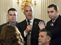 Andrew Pollack, whose daughter Meadow was one of the 17 people killed at Marjory Stoneman Douglas High School, center, speaks during a listening session with U.S. President Donald Trump, not pictured, on gun violence with high school students, teachers and parents in the State Dining Room of the White House …