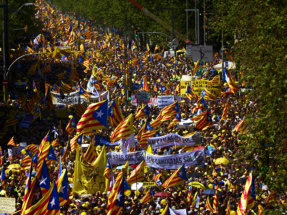 Demonstrators wave esteladas or independence flags in Barcelona, Spain, Sunday, April 15,