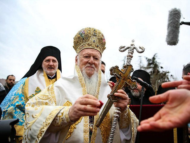 ISTANBUL, TURKEY - JANUARY 06: Fener-Greek Patriarch Bartholomew I leads a 'cross-throwing