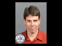 Fredrick-Blue-Manzanares-Aurora-Police Fredrick Blue Manzanares (pictured), 50, and 48-year-old Janette Eileen Solano, his ex-girlfriend, have been charged with four counts of cruelty to an animal, including neglect and mistreatment. (Photo: Aurora Police Department)