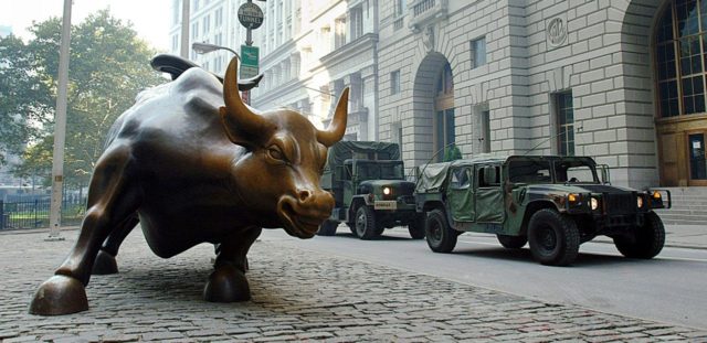 NEW YORK, NY - SEPTEMBER 15: A National Guard security patrols pases by the bull market s