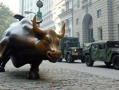 NEW YORK, NY - SEPTEMBER 15: A National Guard security patrols pases by the bull market s