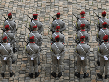 Soldiers stand during the National Tribute ceremony for late member of the Academie Francaise Jean d'Ormesson at the Invalides in Paris on December 8, 2017. / AFP PHOTO / ludovic MARIN (Photo credit should read LUDOVIC MARIN/AFP/Getty Images)