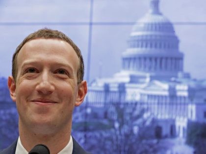 Facebook co-founder, Chairman and CEO Mark Zuckerberg arrives to testify before the House Energy and Commerce Committee in the Rayburn House Office Building on Capitol Hill April 11, 2018 in Washington, DC. This is the second day of testimony before Congress by Zuckerberg, 33, after it was reported that 87 …