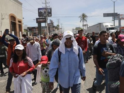 HERMOSILLO, MEXICO - APRIL 23: Central American immigrants, part of an immigrant "caravan," march in protest against U.S. President Donald Trump on April 23, 2018 in Hermosillo, Mexico. They demonstrated against Trump's morning tweets calling for U.S. Homeland Security to stop them from crossing the border into the United States …