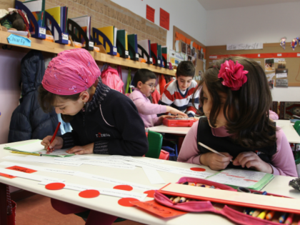 BERLIN - APRIL 14: Schoolgirls write during a lesson at the privat TUEDESB (a Turkish-Germ