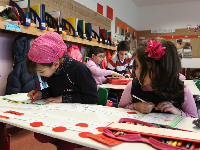 BERLIN - APRIL 14: Schoolgirls write during a lesson at the privat TUEDESB (a Turkish-German education institute) primary school on April 14, 2010 in Berlin, Germany. Turkish Prime Minister Recep Tayyip Erdogan recently suggested Germany should encourage more Turkish-language schools in Germany. His comments reignited the debate on Turkish integration …