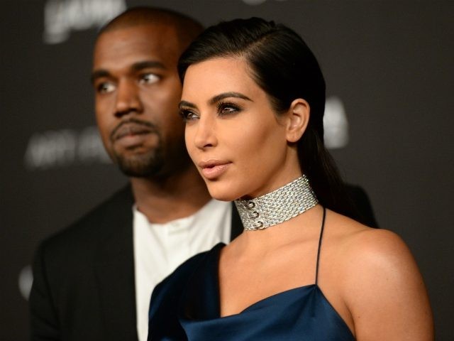 Recording artist Kanye West and TV personality Kim Kardashian West attend the 2014 LACMA A