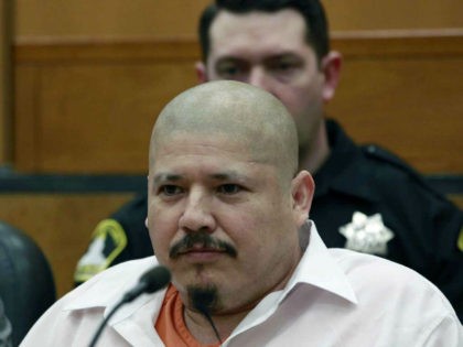 Luis Bracamontes glares at the jury as smiles as the verdict was read in the killing of two law enforcement officers, in Sacramento Superior Court, Friday, Feb. 9, 2018, in Sacramento, Calif. Bracamontes was found guilty of shooting Sacramento County sheriff’s Deputy Danny Oliver in 2014, then killing Placer County …