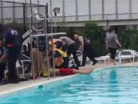 Mateusz-Fijalkowski-pool-rescue-large-screenshot Mateusz Fijalkowski, 23, is suing the police officers and lifeguard who pulled him out of a swimming pool when he tried to drown himself.