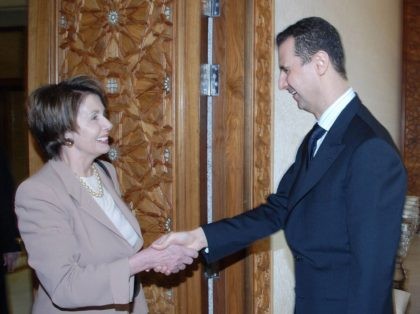 Nancy Pelosi and Bashar Assad (Sana / Associated Press)