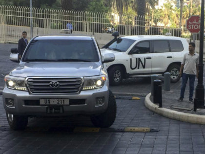 United Nations vehicles carry the team of the Organization for the Prohibition of Chemical Weapons (OPCW), arrive at hotel hours after the U.S., France and Britian launched an attack on Syrian facilities to punish President Bashar Assad for suspected chemical attack against civilians, in Damascus, Syria, Saturday, April 14, 2018. …