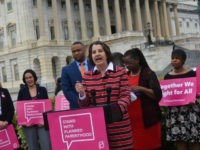 Planned-Parenthood-press-conference-Penny-Starr-Breitbart-News Dawn Laguens, executive vice president of Planned Parenthood Federation of America, spoke at a press conference this week on Capitol Hill about a campaign to maintain its funding stream from taxpayers. Rep. Gwen Moore (D-WI), right, and Rep.March Veasey (D-TX) also spoke at the press conference. (Penny Starr/Breitbart News)