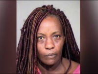 Sharron-Dobbins-Maricopa-County-Sheriff’s-Office An Arizona mother has been arrested and charged with felony child abuse for using a Taser on her 16-year-old son to wake him up for Easter Sunday services, police say.