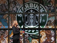 Starbucks-woman-bars-ap In this Tuesday, March 21, 2017, file photo, a woman walks past a Starbucks coffee shop in Sewickley, Pa. Starbucks Corp. reports earnings Thursday, Jan. 25, 2018. (AP Photo/Gene J. Puskar, File)