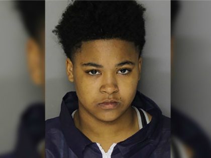 Tyana Keyshawn Holmes, 16, and an unidentified 14-year-old girl were arrested and charged with carjacking a pregnant teacher outside a Maryland elementary school, police said.
