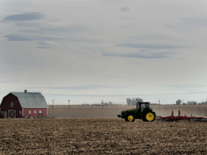 A farmer plows his fields in the small northeastern agricultural town of Eaton, Colorado,