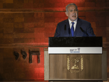 Israeli Prime Minister Benjamin Netanyahu speaks during the Holocaust Remembrance Day ceremony at the Yad Vashem Holocaust memorial in Jerusalem, Wednesday, April 11, 2018. Israel is commemorating its Holocaust Remembrance Day in memory of the 6 million Jews systematically killed by Nazi Germany and its collaborators during World War II. …