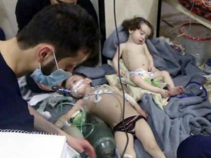 A video image provided by the Syrian Civil Defense, an aid group, of toddlers after a suspected chemical attack in the rebel-held Syrian suburb of Douma on Sunday. Credit Syrian Civil Defense White Helmets, via Associated Press