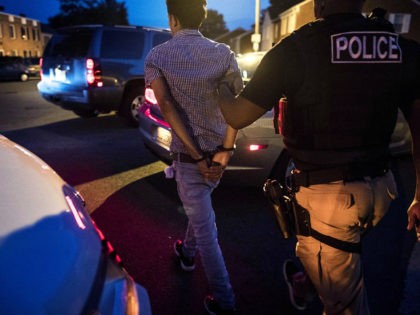MANASSAS, VA - Northern Virginia Gang Task Force officers partner with ICE officer to arrest an alleged MS-13 gang member in a Manassas, Virginia neighborhood Thursday evening August 10, 2017. (Photo by Melina Mara/The Washington Post via Getty Images)