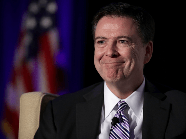Federal Bureau of Investigation Director James Comey delivers the keynote remarks at the Intelligence and National Security Alliance Leadership Dinner March 29, 2017 in Alexandria, Virginia. While testifying before the House Intelligence Committee last week, Comey said the FBI is investigating the Trump campaign's ties to Russia, and will pursue …