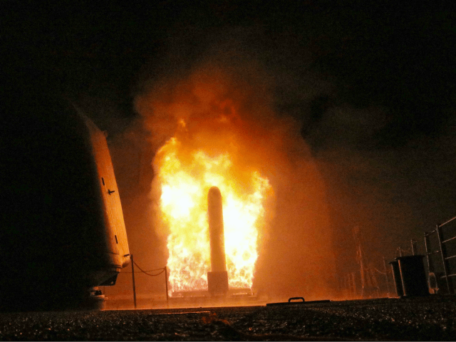 In this image provided by the U.S. Navy, the guided-missile cruiser USS Monterey (CG 61) fires a Tomahawk land attack missile early Saturday, April 14, 2018, as part of the military response to Syria's use of chemical weapons on April 7. The United States, France and Britain launched military strikes …