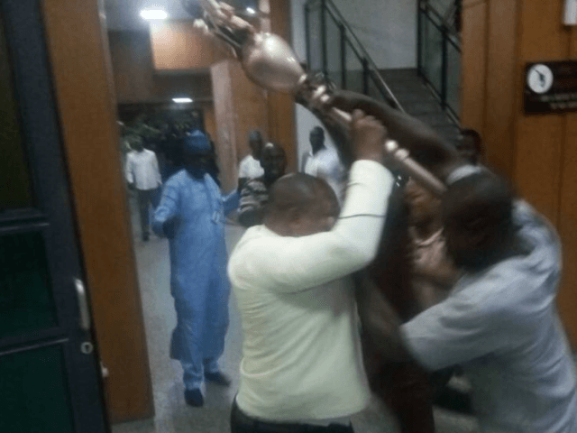 Intruders seize the symbol of authority of the upper house of Parliament, the mace, in the