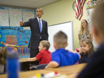 President Barack Obama takes questions from first grade students during a classroom visit at Gen. Clarence Tinker elementary school at MacDill Air Force Base, Fla., Wednesday, Sept. 17, 2014. Obama is returning to Washington after visiting US Central Command (CentCom) and was updated on the ongoing military campaigns in Iraq …