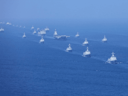 In this April 12, 2018 photo released by Xinhua News Agency, the Liaoning aircraft carrier is accompanied by navy frigates and submarines conducting an exercises in the South China Sea. China has announced live-fire military exercises in the Taiwan Strait amid heightened tensions over increased American support for Taiwan. The …