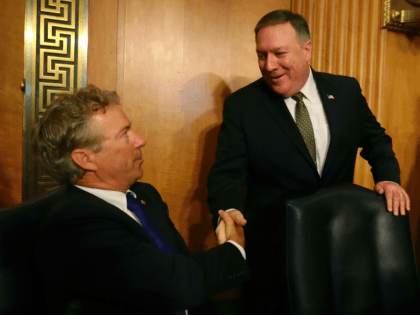 Secretary of State nominee Mike Pompeo (R), greets Sen. Rand Paul (R-KY), during his confirmation hearing before a Senate Foreign Relations Committee on Capitol Hill, on April 12, 2018 in Washington, DC. President Trump nominated Pompeo to replace Rex Tillerson as Secretary of State. (Photo by Mark Wilson/Getty Images)