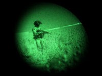 soldier-night-vision-goggles-file-ap U.S. Army flight crew chief Sgt. Robert Terrants is seen through night vision goggles as he stands in an opium field while waiting to medevac a lightly injured Marine in a helicopter of the U.S. Army's Task Force Lift "Dust Off", Charlie Company 1-214 Aviation Regiment north of Sangin, in …