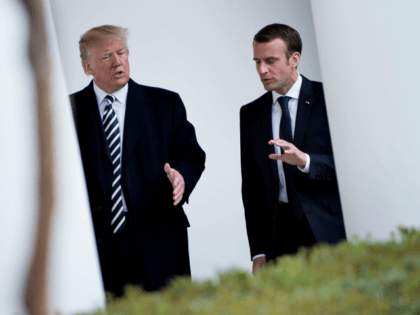 US President Donald Trump (L) and France's President Emmanuel Macron walk to the West Wing
